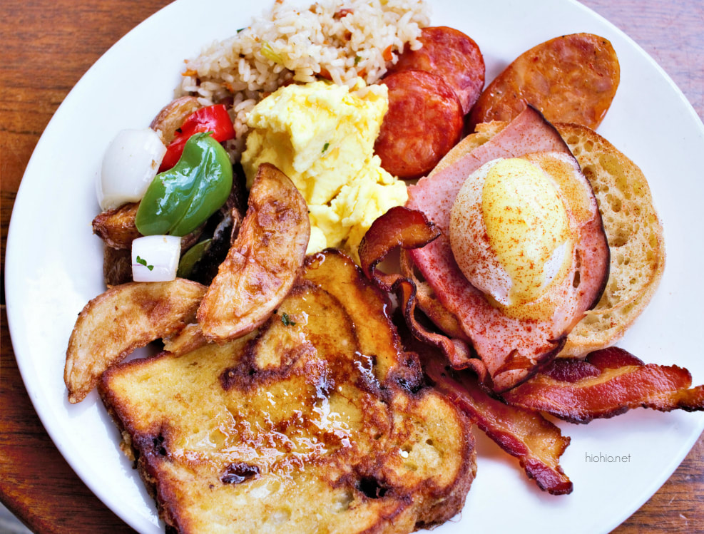 Duke's Waikiki Honolulu Hawaii (Breakfast Buffet plate with potatoes, eggs, bacon, french toast, fried rice, Chicken sausage, eggs Benedict, Portuguese sausage).  